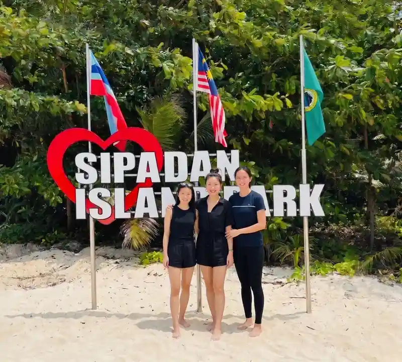 Exploring the Sipadan Island coral reefs with Sunny Holiday in the Celebes Sea.